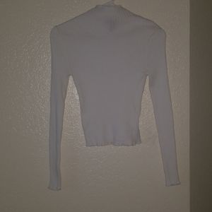 White turtleneck long sleeved shirt ribbed